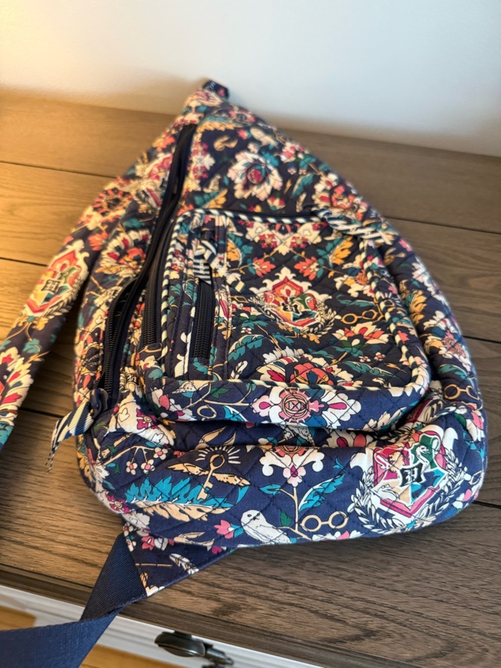 Vera Bradley Navy Quilted Floral Sling Backpack